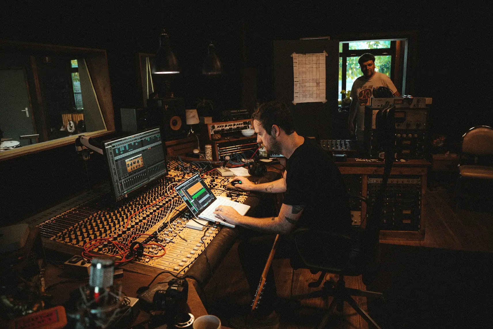 Jay Maas at a mixing console in the studio